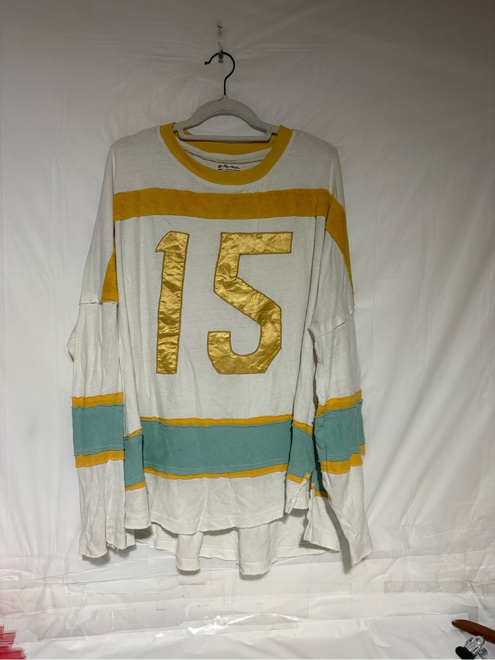 We The Free White Long Sleeve Crop Top with Gold '15' and Teal Stripes